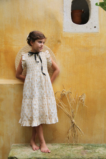 Long dress with golden flowers on ivory